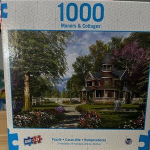 New in box- 1000 piece puzzle “Manors & Cottages”